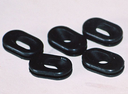 Custom Rubber Grommet with Angled Thru Hole Custom Rubber Corp